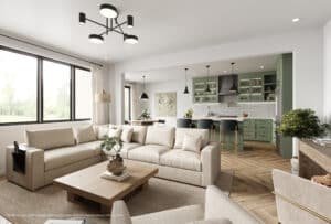 Family room with L-shaped beige sofa, wood coffee table, and kitchen with green cabinetry and pendant lights
